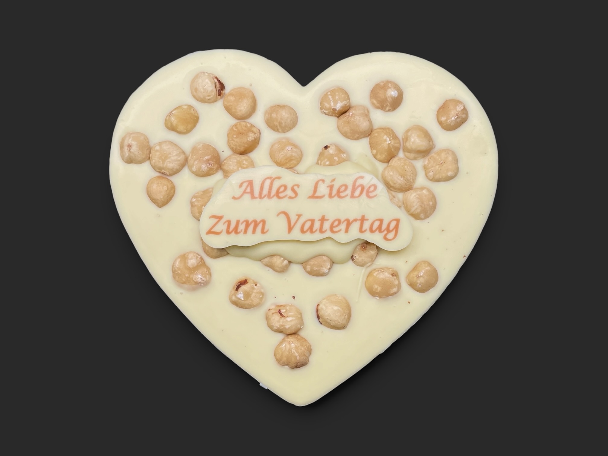 Schoko-Herz mit Beschriftung und Haselnüsse "zum Vatertag", 150g – Bild 5