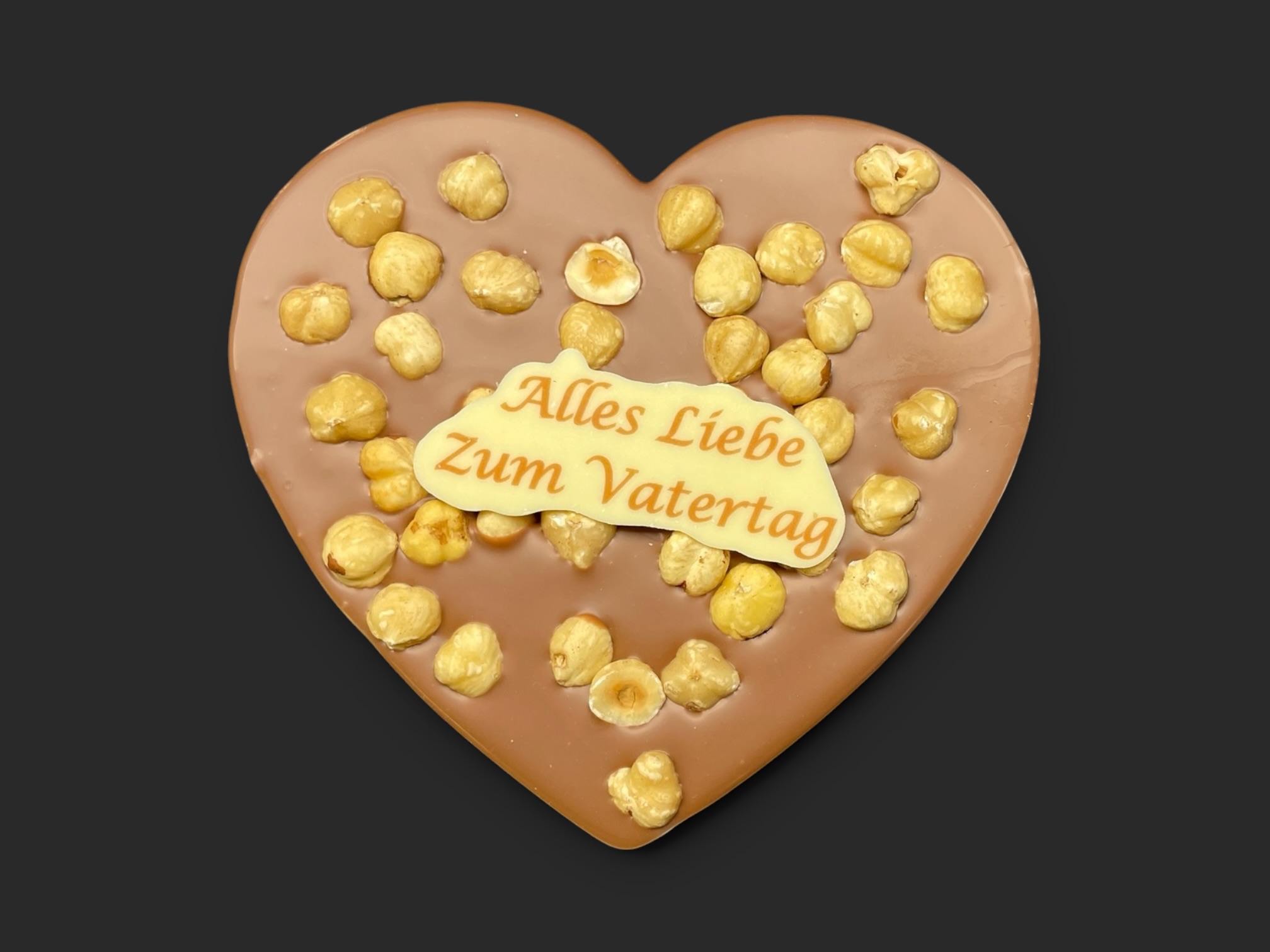 Schoko-Herz mit Beschriftung und Haselnüsse "zum Vatertag", 150g – Bild 3