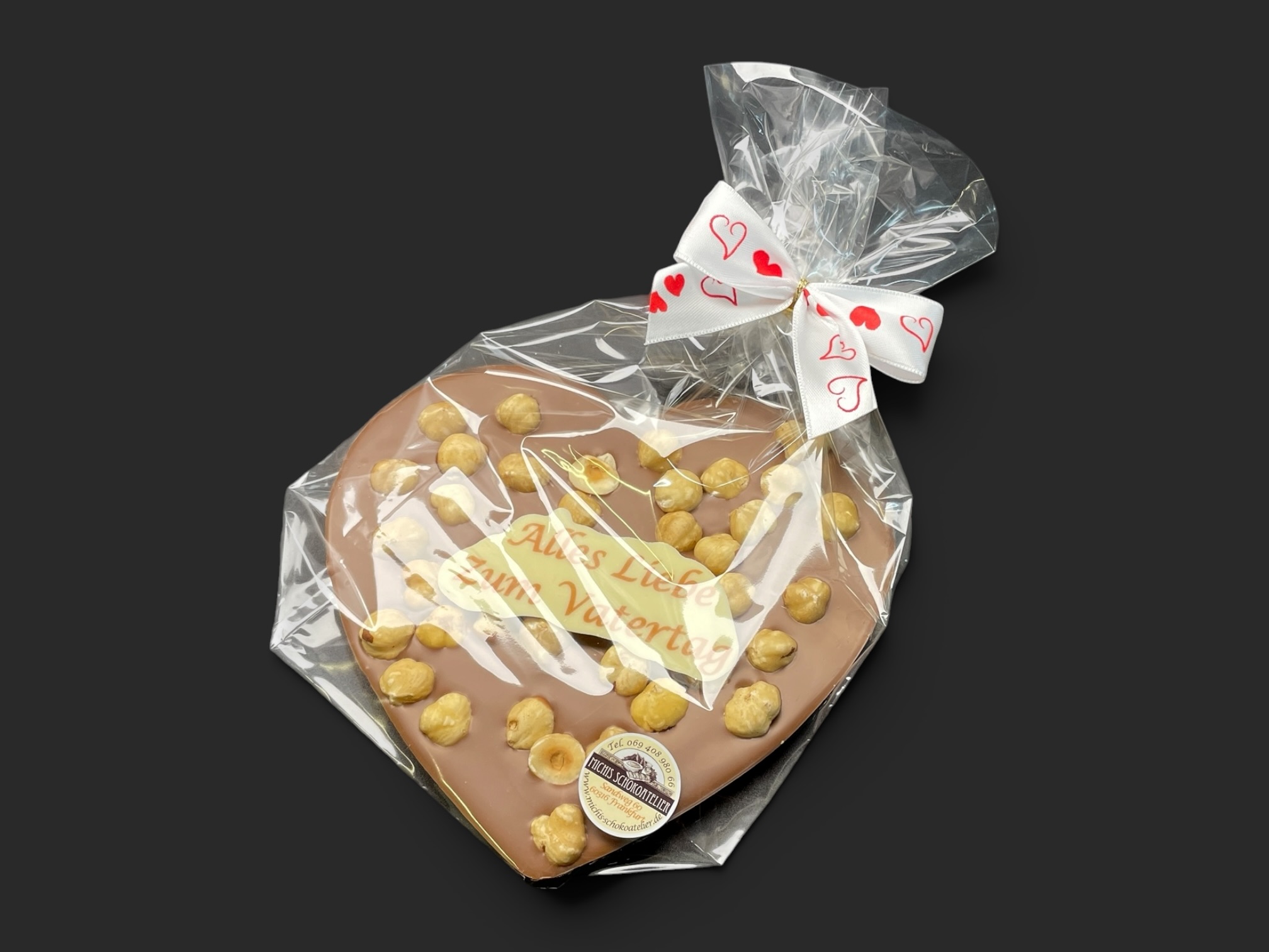 Schoko-Herz mit Beschriftung und Haselnüsse "zum Vatertag", 150g – Bild 4