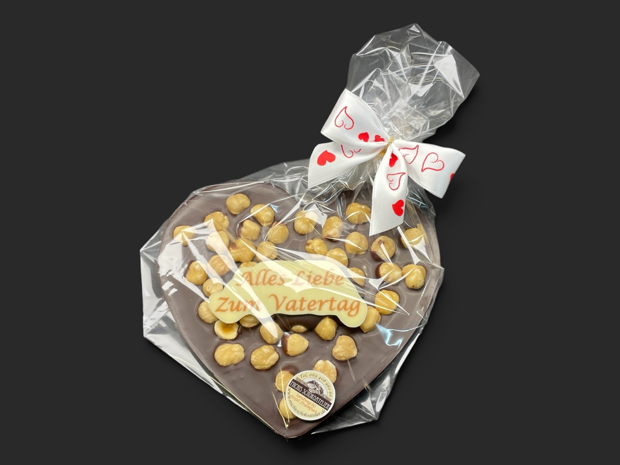 Schoko-Herz mit Beschriftung und Haselnüsse "zum Vatertag", 150g – Bild 2