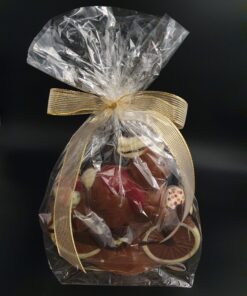 Osterhase auf dem Fahrrad aus Vollmilch-Schokolade, verpackt