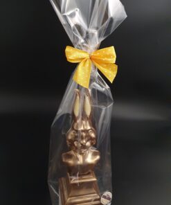 Hasen-Büste aus Zartbitter-Schokolade mit Bronze-Pulver, verpackt