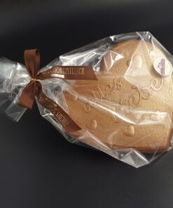 Herz aus Vollmilch-Schokolade mit Schriftzug "alles Liebe" und Bronze-Pulver, verpackt