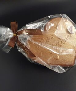 Herz aus Vollmilch-Schokolade mit Schriftzug "alles Liebe" und Bronze-Pulver, verpackt